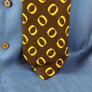 Yves Saint Laurent Paris. Men's Brown Yellow Circular Geometric Tie.